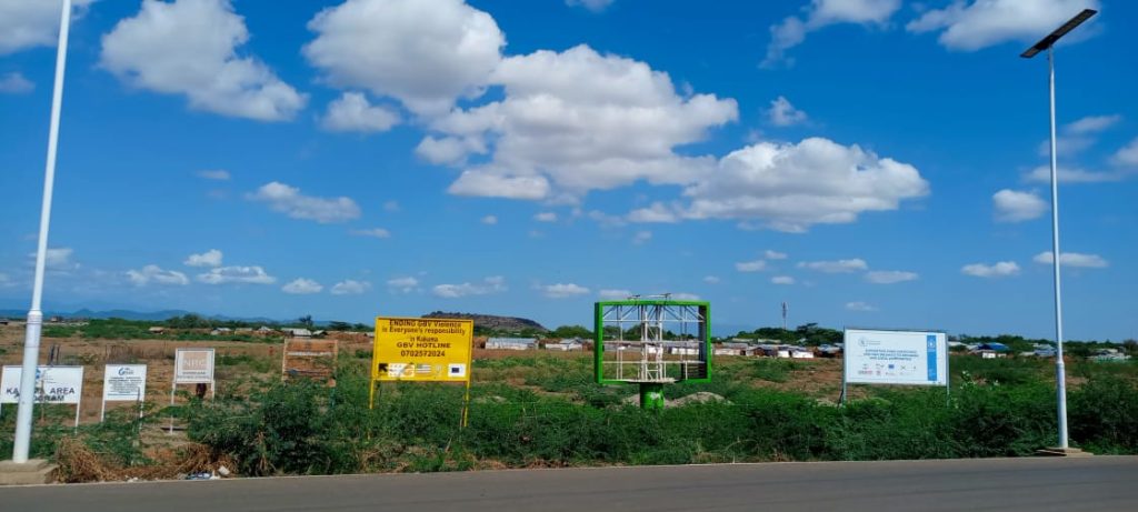 Caption: A view of the settlement areas surrounding Kakuma Refugee Camp. The crowded, arid environment forms the backdrop to the maternal healthcare crisis, exacerbating health risks for new mothers and newborns, as described by interviewees in the report.
